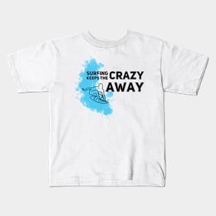 Surfing keeps the crazy away Kids T-Shirt